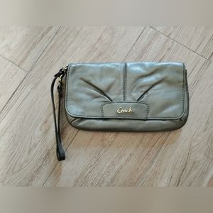 Coach bronze wristlet like new